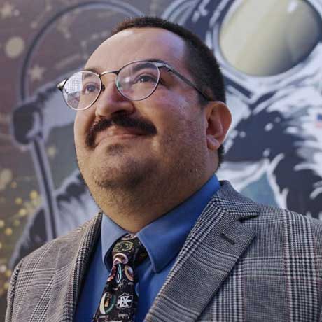 Emmanuel Urquieta standing in front of Space U